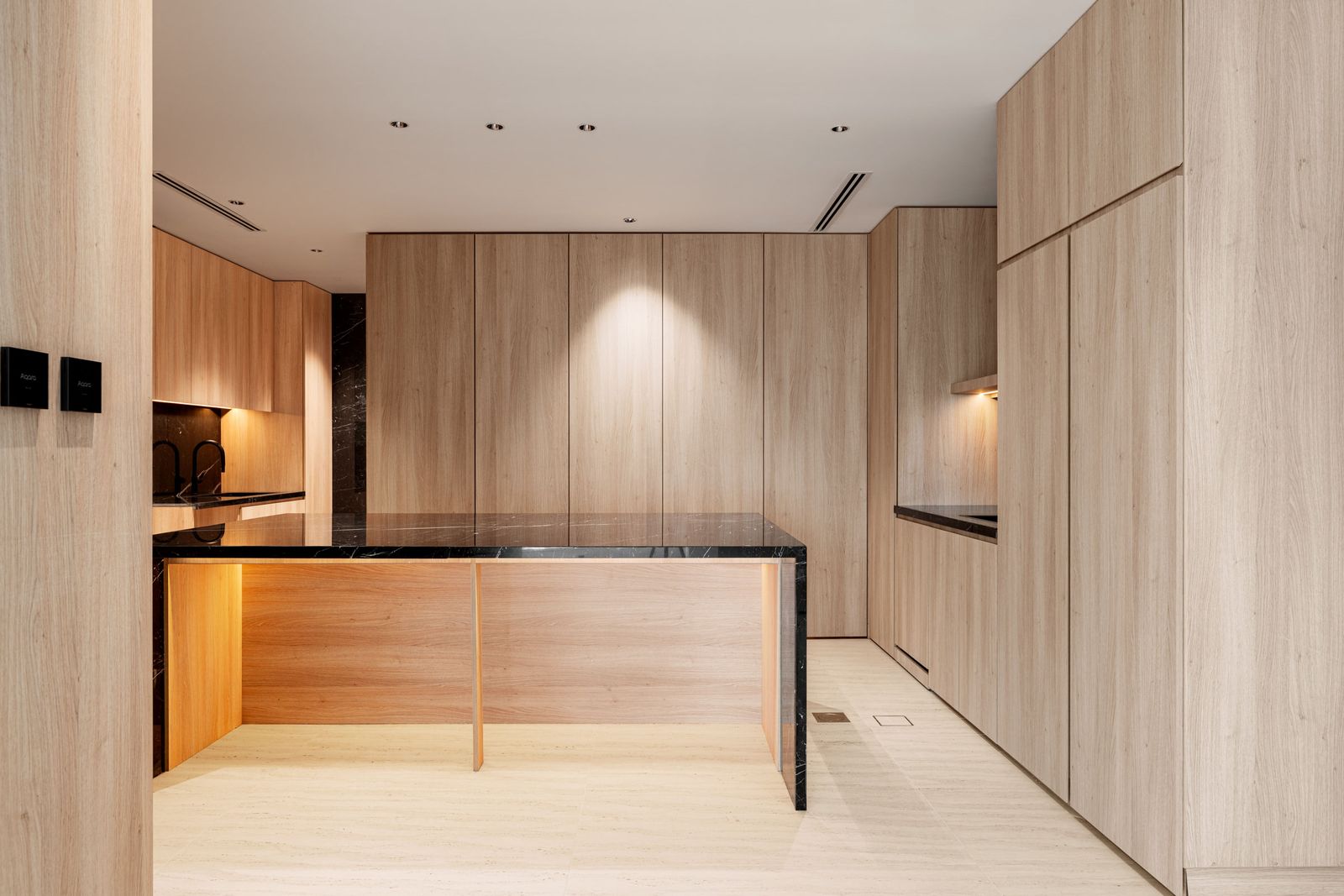 Full-height timber joinery running floor to ceiling